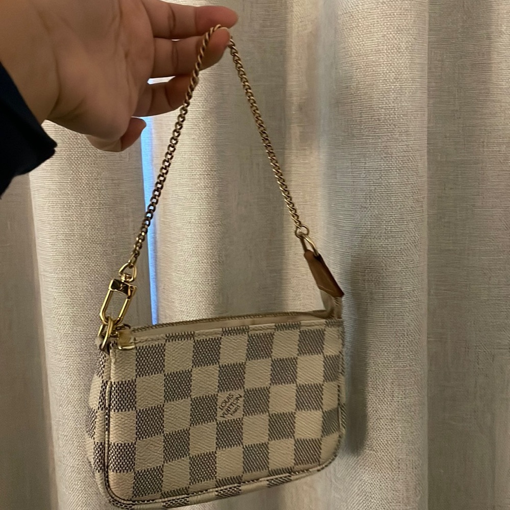 Authentic 💯 pre-loved mini LV damier pouch. No box, or dust bag.
